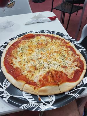 Pizza quattro formaggi (not vegan) at Pizzeria La Faina in Malaga
