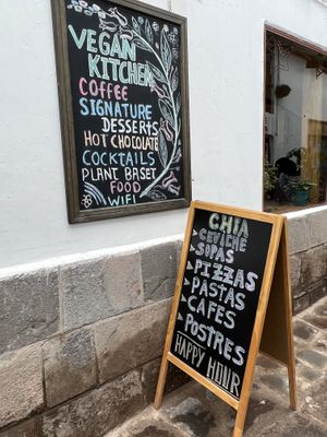Outside signs  at Chia Vegan Restaurant in Cusco