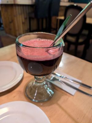 Juice using purple corn! (Bit sour) at Chia Vegan Restaurant in Cusco