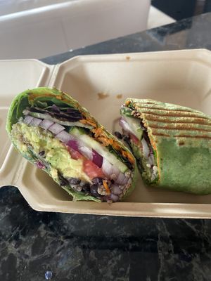 Black bean on spinach wrap  at Apple a Day Store & Cafe in Miami Beach