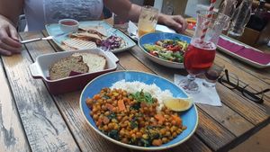 Curry (can be made vegan if asked), very tasty salad and a vegetarian burrito at Culture Club Strudla in Podgorica