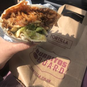 Vegan jackfruit burrito with brand, rice and guacamole ... delicious at Tortilla in Dartford