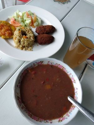 Bean soup, plate with four items, juice drink at Mandira in Pereira