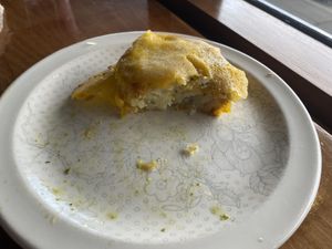 Cheesy hash brown (sorry it’s half eaten 😂) at Portershed in Christchurch