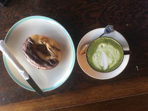 Green antioxidant latte. And a chocolate donut! at Portershed in Christchurch