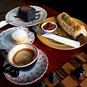 Sausage roll, chocolate peanut butter mudcake, yoyo biscuit! at Portershed in Christchurch