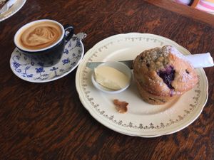 Flat white and a mixed berry muffin  at Portershed in Christchurch