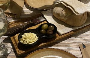 Homemade bread with olives and vegan garlic butter (Margarine)  at Select in Kos