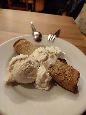 Vegan Palatschinken with vanilla ice cream and whipped cream at Blume Wollbach in Kandern