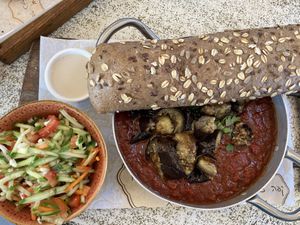 Shakshuka with eggplant (tasty but I wish they had tofu in this dish) at Nimrod Cafe - Port in Tel Aviv