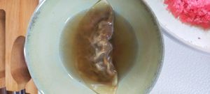 Raviolis ail noir et bouillon dashi at Humus x Hortense in Brussels