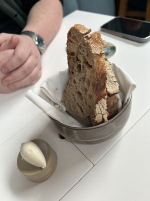 Homemade sourdough with salted almond butterr  at Humus x Hortense in Brussels