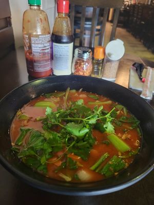Vegan Spicy Thai Lemongrass Soup... added three drops of house chili oil at True Seasons Organic Kitchen in Anaheim