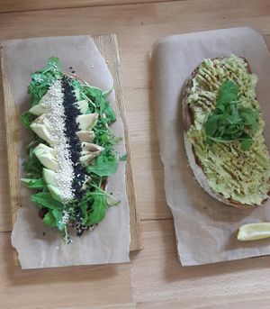 Sliced avocado on toast (veganised), and smashed avo on toast (vegan) at Coffee Room in Prague