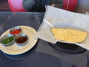 Complimentary appetizers- mint (green), onion (red), tamarind (brown)  at Himalayan Yak in Fargo