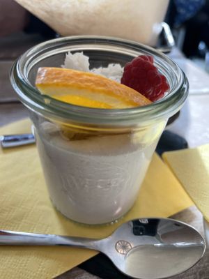 Pana cotta with raspberry and blueberry and orange and coconut flakes  at Veggiezz - Opernring in Vienna