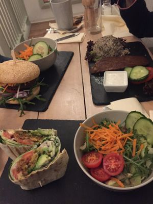 A steak, a burger, and a wrap at Veggiezz - Opernring in Vienna