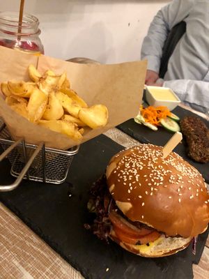 Farmers burger with fries and vegan steak!  at Veggiezz - Opernring in Vienna
