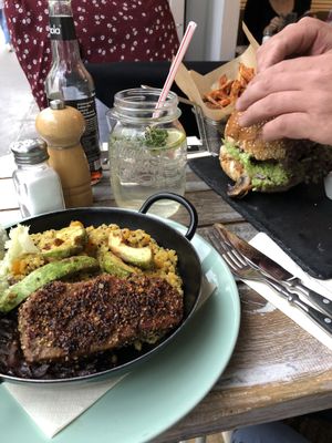Seitan steak with pumpkin quinotto and farmer burger at Veggiezz - Opernring in Vienna