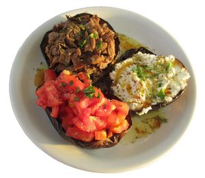 Stuffed vegetarian aubergines with tomato, mushrooms and local cheese at To Spitiko in Paros