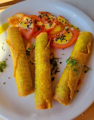 Spinach and cheese rolls at To Spitiko in Paros