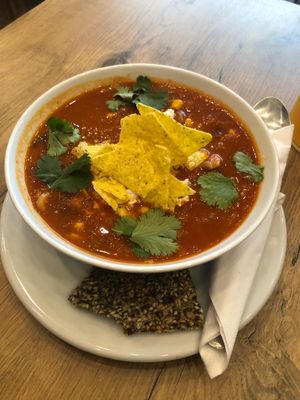 Mexican soup with nachos, ‘sour cream’ and crackers  at Mihiderka in Katowice