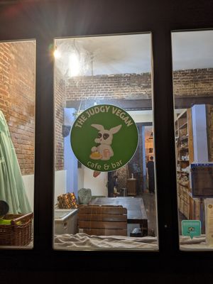 view from outside (at night) at The Judgy Vegan in Brussels