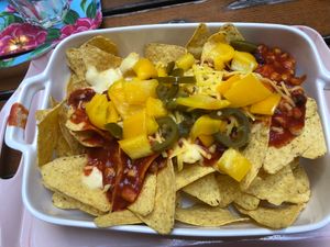 Nachos with jalapeños, bell peppers, kidney beans, cream cheese, cheese & salsa at The Judgy Vegan in Brussels