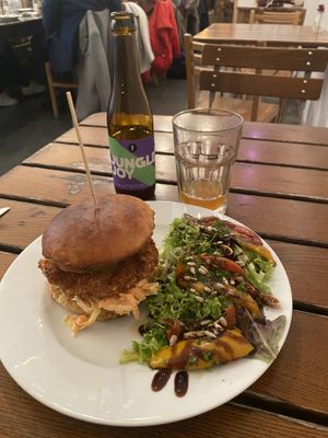 Lovely and cozy place ! I had the seitan burger, not spicy, it was good, despite the fact that I found it a little bit dry… but good ! And the vegan beer … amazing !   at The Judgy Vegan in Brussels