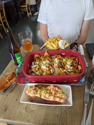 Fries, nachos, cheese croquettes, lobster roll at The Judgy Vegan in Brussels