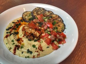 New Suggestion, the Hummus Bowl with spicy tofu, grilled aubergines and pita bread, everything homemade at The Judgy Vegan in Brussels