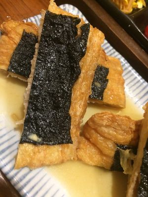 stuffed tofu fried skin with nori seaweed and lemon. My favorite ! at Hoshina 穗科 - Zhongshan District in Taipei