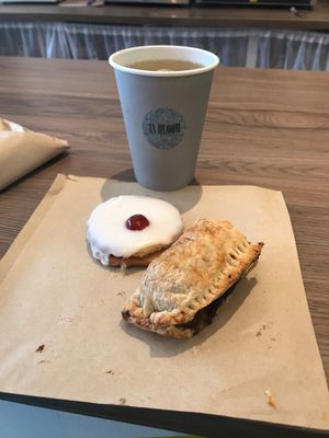 Amazing latte, empire biscuit and sausage roll.  at In Bloom in Glasgow