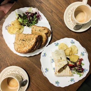 philly cheesesteak (top left) and meatless meatball wrap (bottom right) at In Bloom in Glasgow