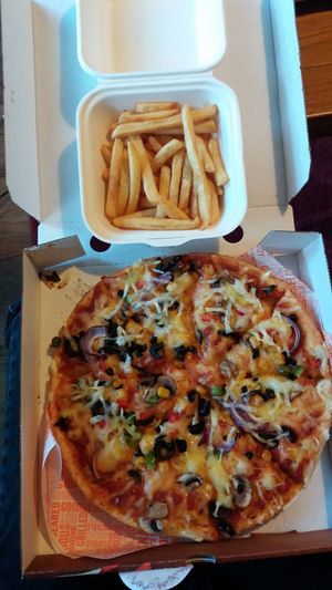 veggie supreme and fries at Zad's in Manchester