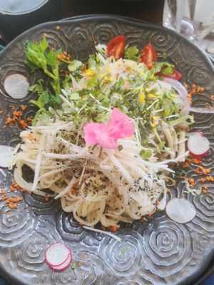 Nice place bit tucked away and chilled out music inside! We got the brown rice plate and the noodle plate to share and the blueberry smoothie all very tasty for a lighter lunch. at Kururu in Nara