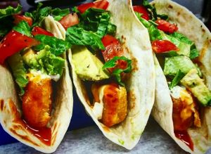 Vegan fish tacos with a vegan tarter sauce and mango habanero drizzle at D'Angelo's in Bay City