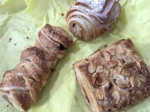 Clockwise from top: chocolate, almond, and strudel .  at La Masa Panaderia in La Paz