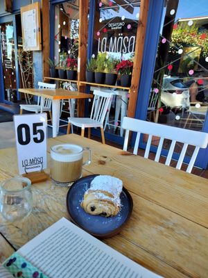 Oat milk Cappuccino and chocolatin, which was crunchy and delicious. I got 2 at La Masa Panaderia in La Paz