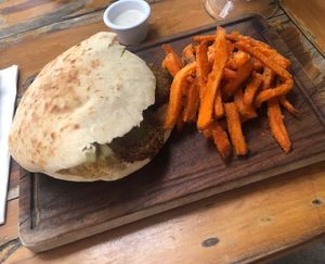 Falafel pita with sweet potato chips  at Aroma Isla in Isla Mujeres