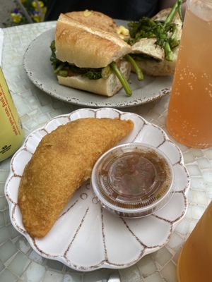 Beef empanada, chicken and broccoli rabe hero  at Alt Eats in Ho-ho-kus