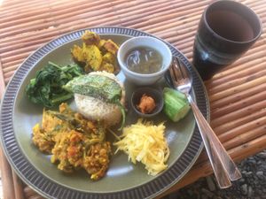 Daily special. Amazing flavors. Papaya salad, curry okra, grilled jalapeños, homemade chutney  at Uguisu Sabou in Kampot