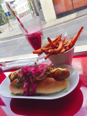 Vegan dog, sweet potato fries and a black currant refresher  at The Diner in Stroud