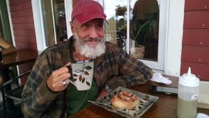 one happy senior citizen at Sweet Alchemy Bakery and Cafe in Essex Junction