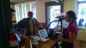 happy owner at Sweet Alchemy Bakery and Cafe in Essex Junction