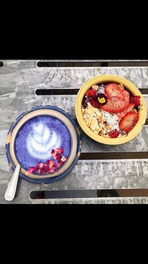 Acia bowl and blue butterfly latte  at Farm Girl Cafe in West London