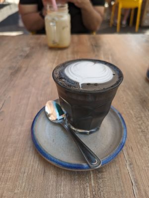 Black latte at Farm Girl Cafe in West London