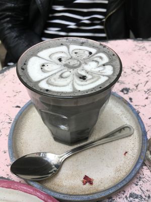 Latte Black with charcoal, date syrup and almond milk. at Farm Girl Cafe in West London