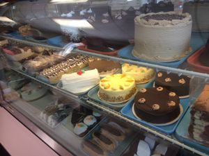 Vegetarian, not vegan, white trays have dairy  at Malek's Brighton Bakery in Rochester