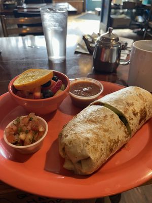 Vegan burrito with fruit side     at Squeeze In in Truckee